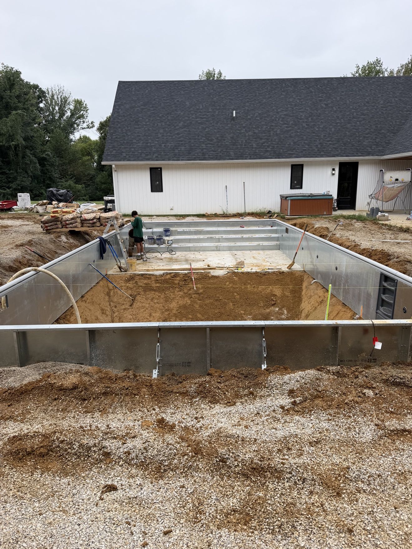 Pool floor work in progress seen from the steps end of the build
